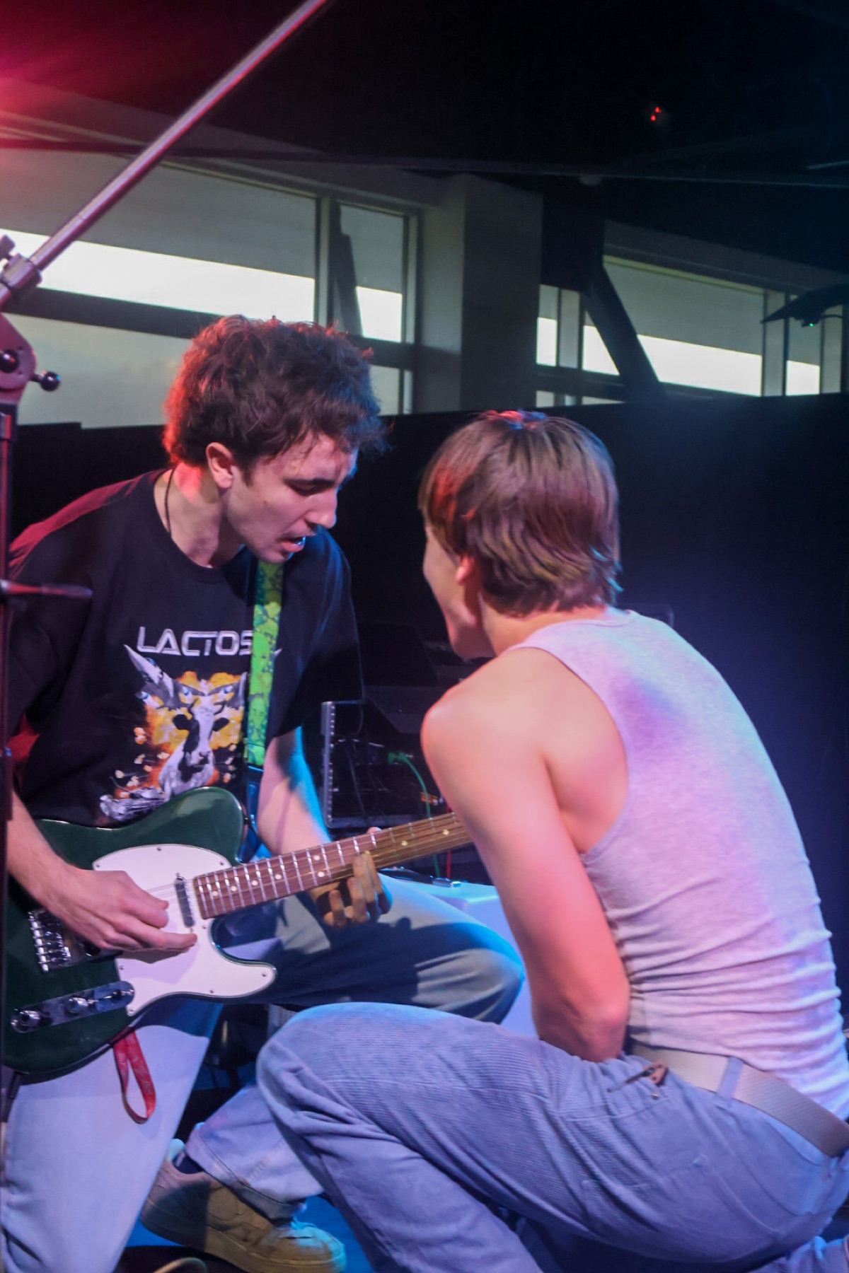 Jace with Zayah crouched on vocals